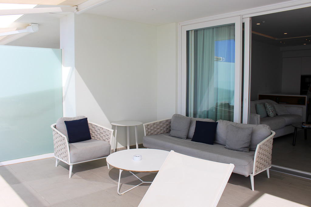 Spacious terrace with ocean view and direct access to the living room and kitchen in Royal Hideaway Corales Suites apartment 1308.