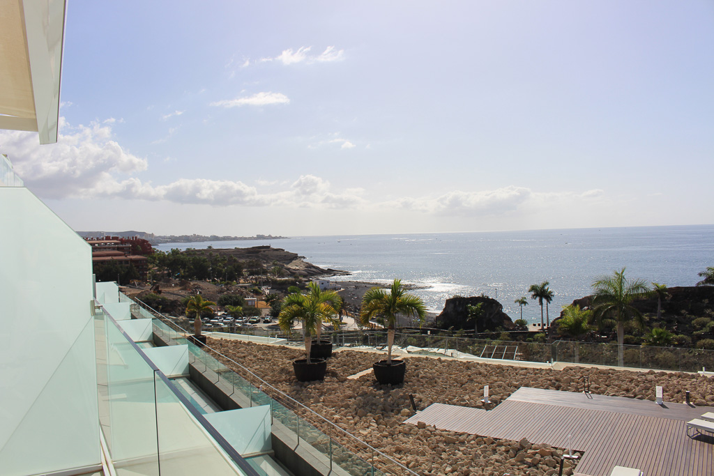 Spacious terrace with ocean view and direct access to the living room and kitchen in Royal Hideaway Corales Suites apartment 1308.