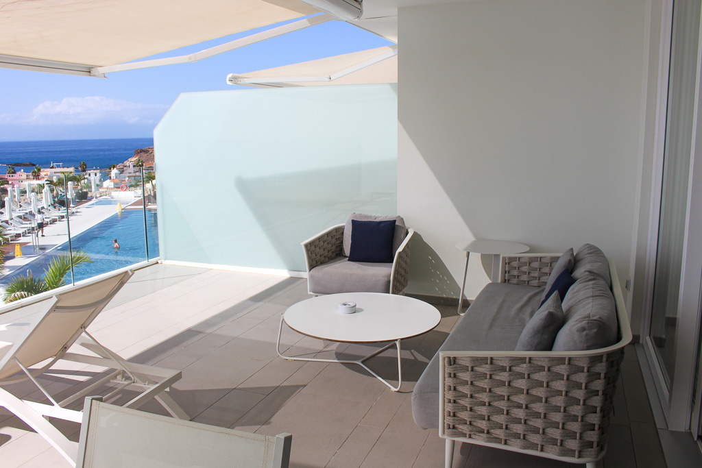 Spacious terrace with ocean view and direct access to the living room and kitchen in Royal Hideaway Corales Suites apartment 1308.