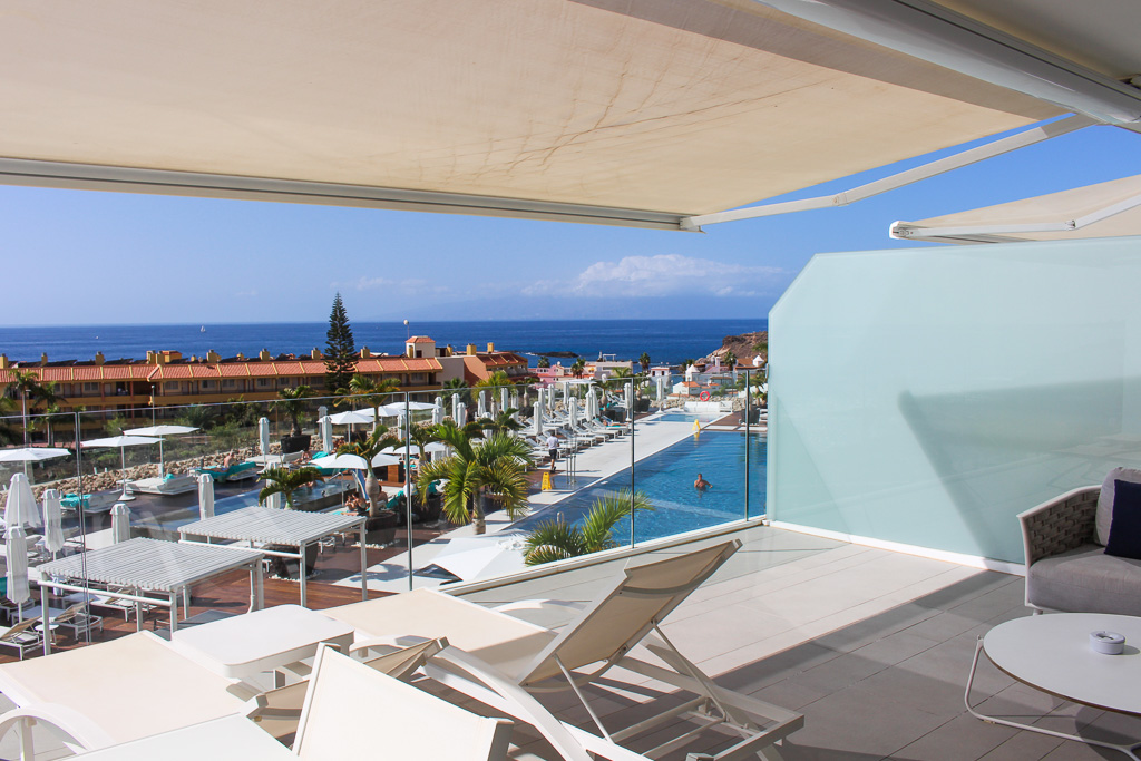 Spacious terrace with ocean view and direct access to the living room and kitchen in Royal Hideaway Corales Suites apartment 1308.