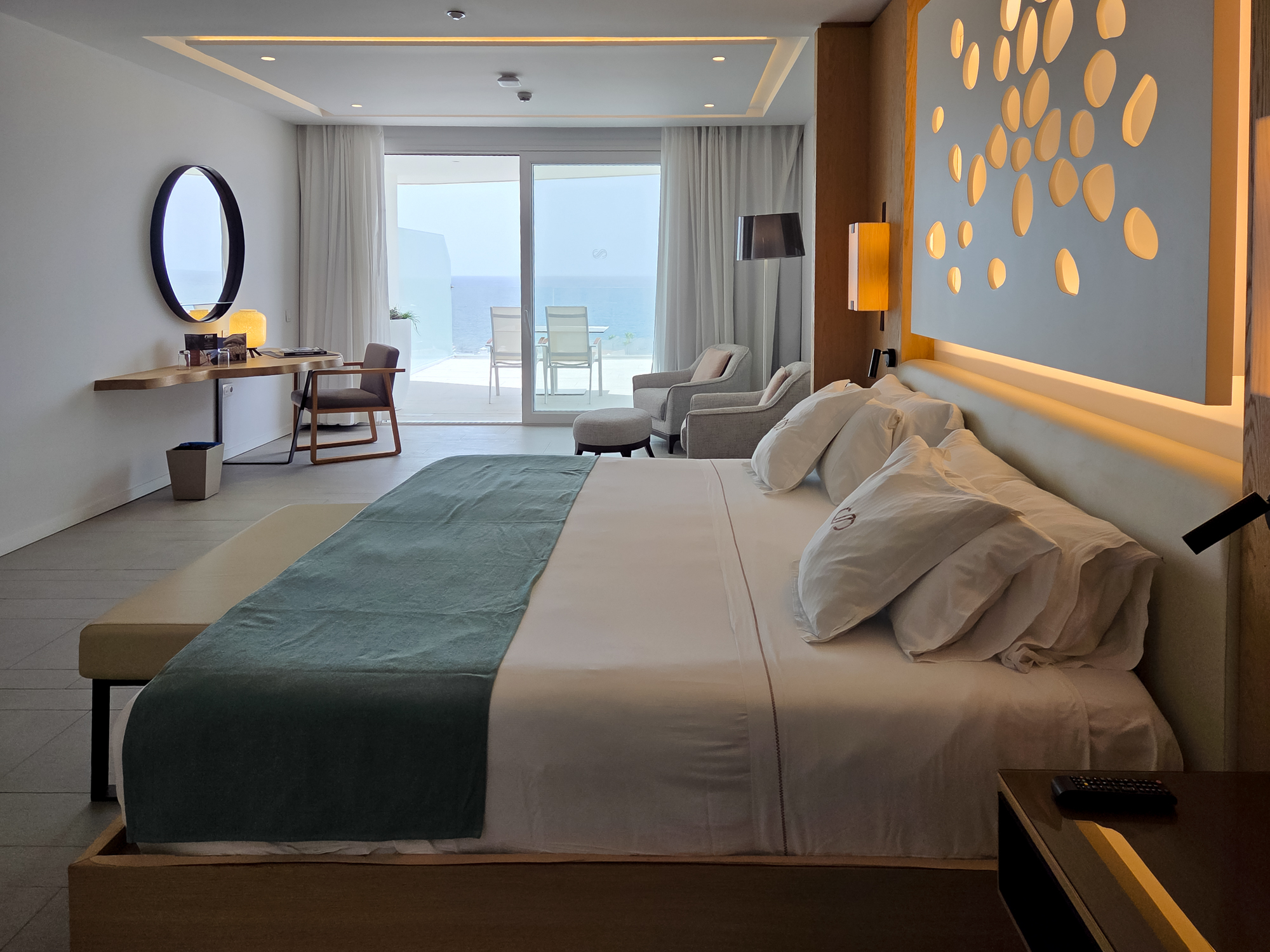 Corner Junior Suite 2401 with panoramic ocean views at Royal Hideaway Corales Beach in La Caleta, Tenerife.