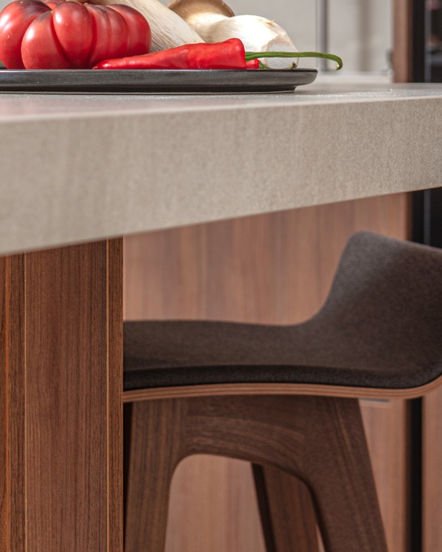 tomatoe, pepper, and luxury desigenr chair, stone coutertop
